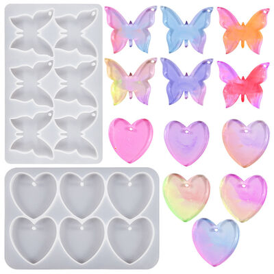 DIY pegamento de gota de cristal seis agujeros de unión amor mariposa colgante llavero colgante decoración de silicona molde mayorista