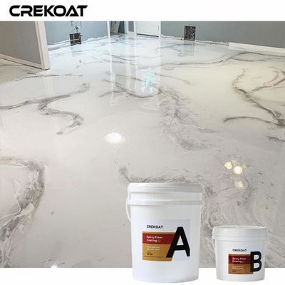 El revestimiento de piso de epoxi metálico de acabado liso sin costura crea un efecto de mármol único