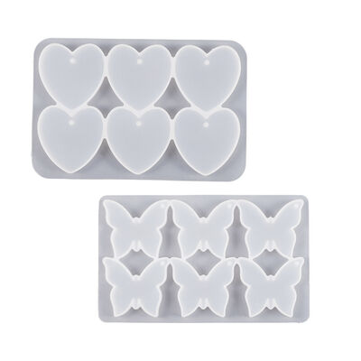 DIY pegamento de gota de cristal seis agujeros de unión amor mariposa colgante llavero colgante decoración de silicona molde mayorista