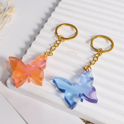 DIY pegamento de gota de cristal seis agujeros de unión amor mariposa colgante llavero colgante decoración de silicona molde mayorista