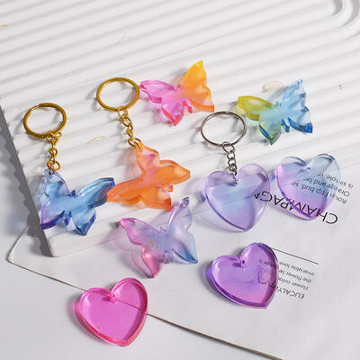 DIY pegamento de gota de cristal seis agujeros de unión amor mariposa colgante llavero colgante decoración de silicona molde mayorista