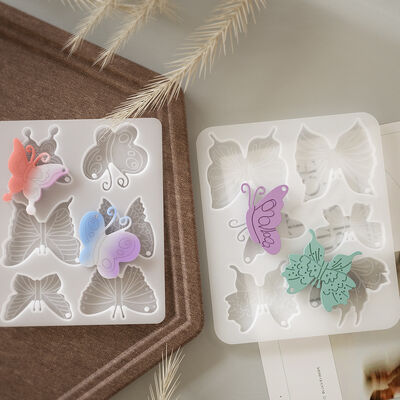 Crystal dropper DIY resin aromatherapy pendant, multiple butterfly keychain pendants, silicone mold wholesale